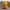 Super Saiyan 3 duck camera-facing three-quarter view with a rocky mountain background