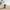 Palm Tree Coconut Duck front-facing view on a tropical beach