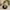 Dapper Groom Duck front view on a wedding-themed background