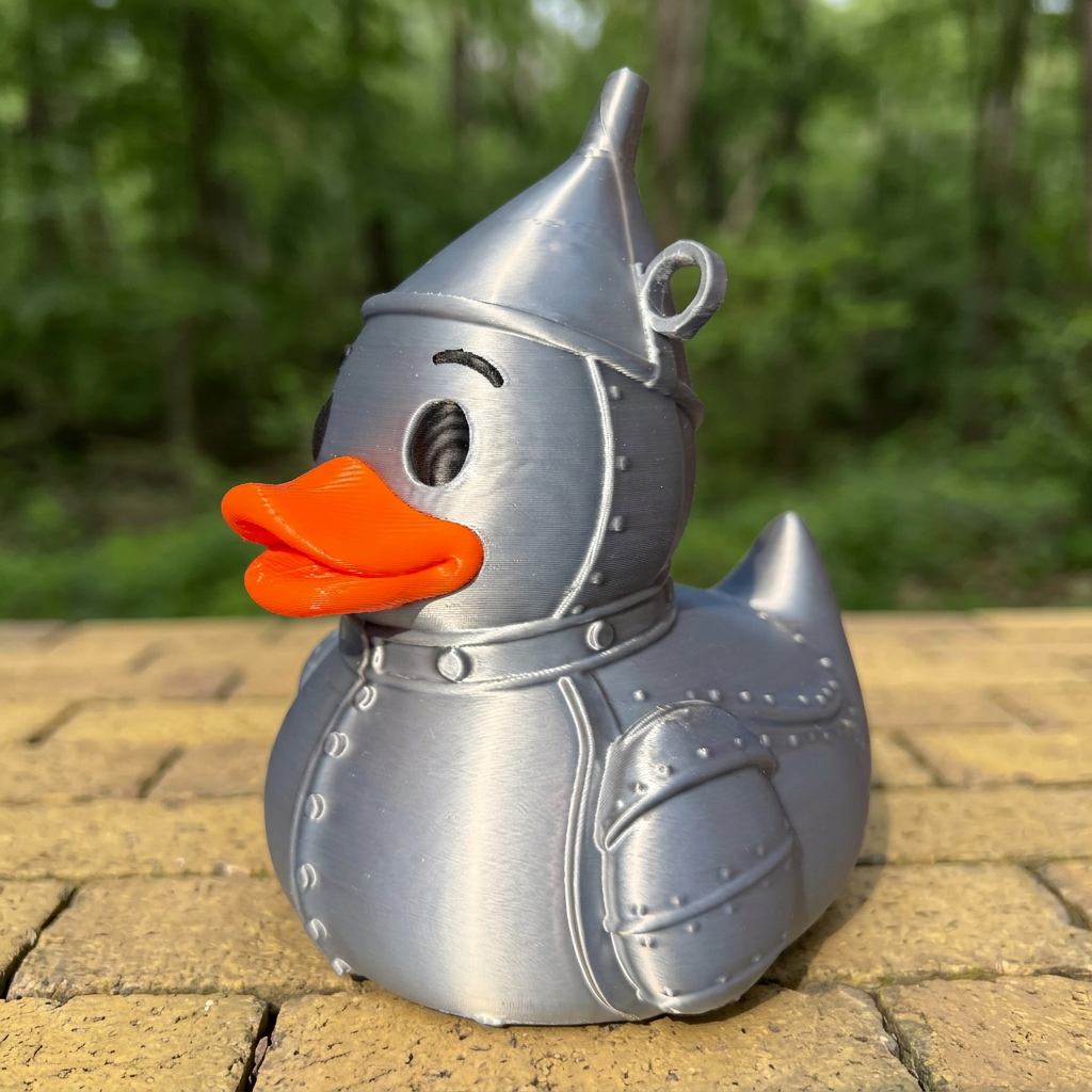 Tin Man-Inspired Duck camera-facing three-quarter view on a yellow brick path